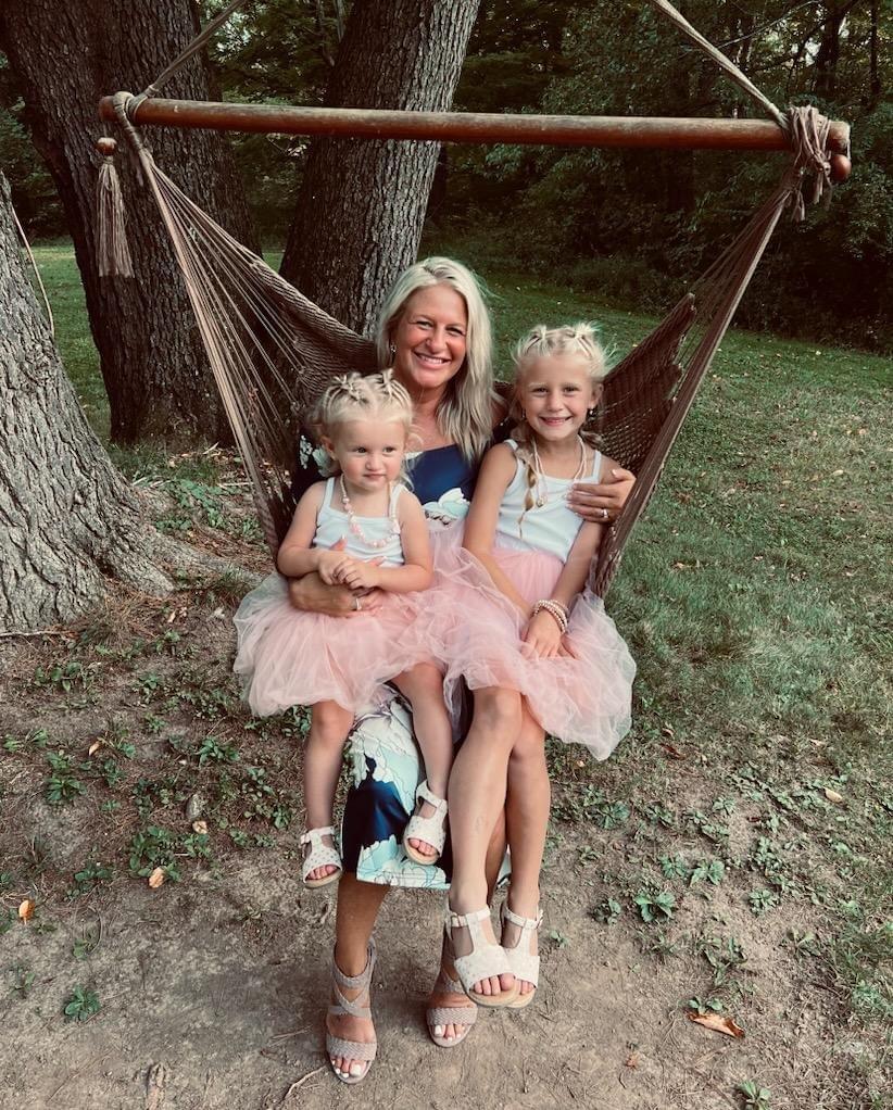 Family sitting in a hammock